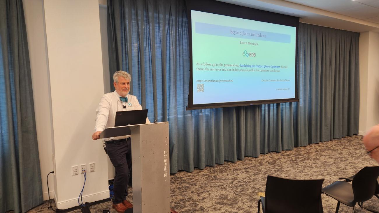 Bruce Momjian delivers a talk on "Beyond joins and indexes"