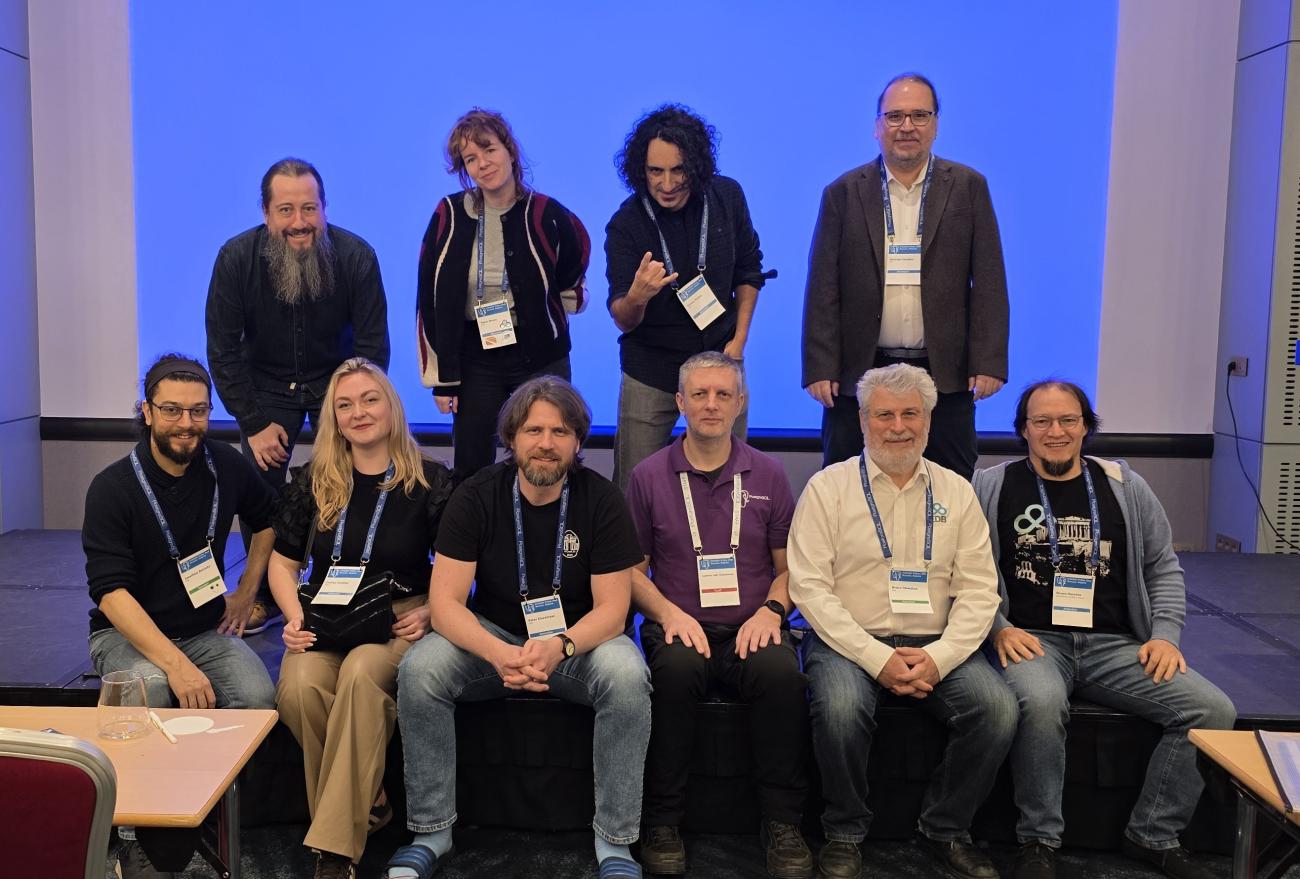 Team photo at FOSDEM PGDay