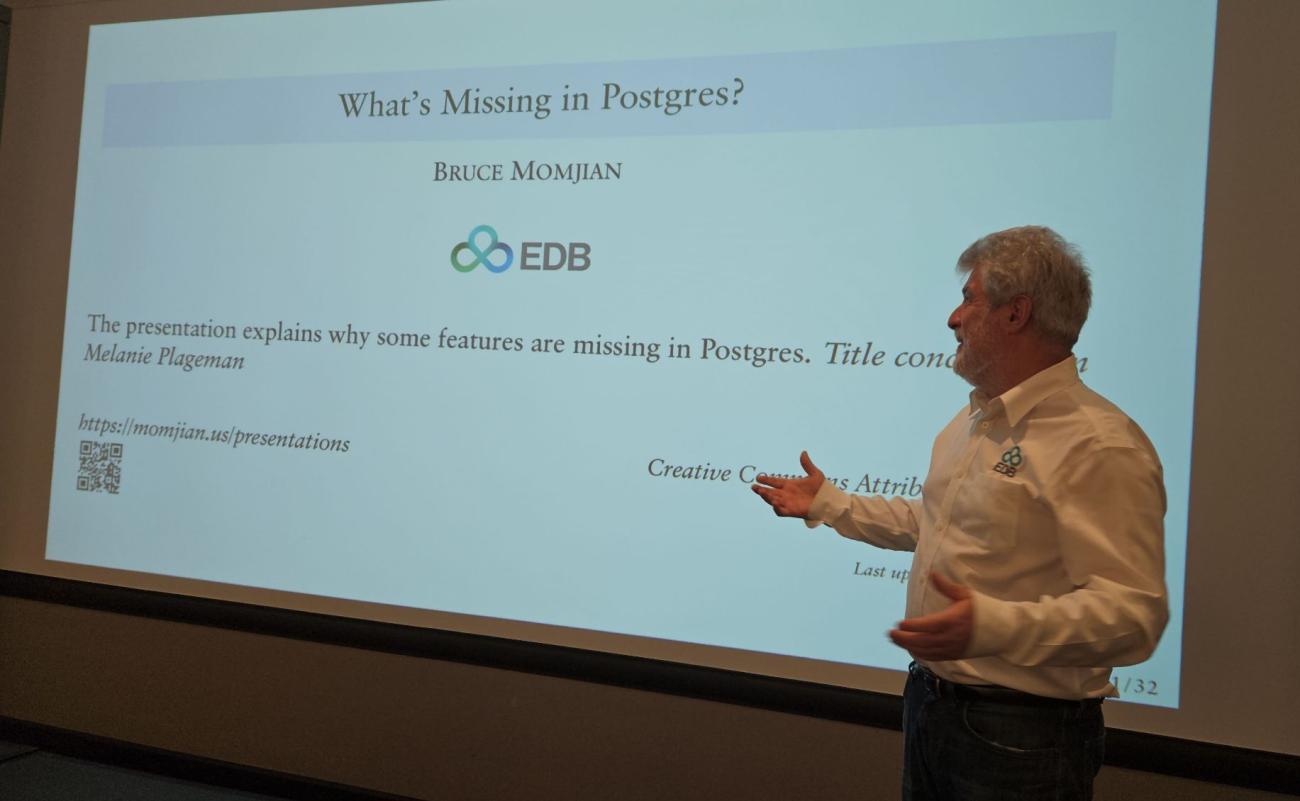 Bruce Momjian presenting at FOSDEM PGDay 