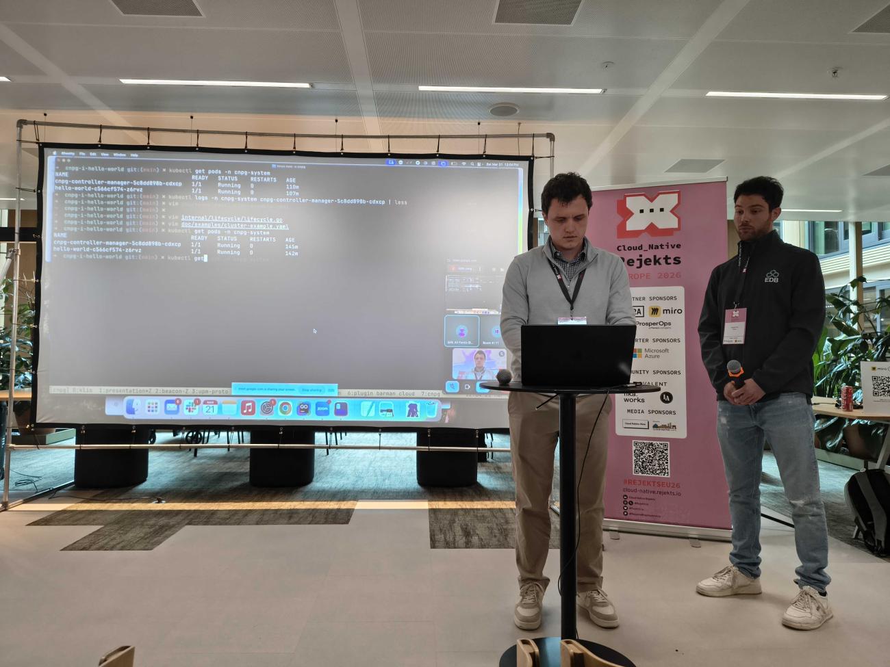 John Long demo-ing CloudNativePG during their Cloud Native Rejekts talk