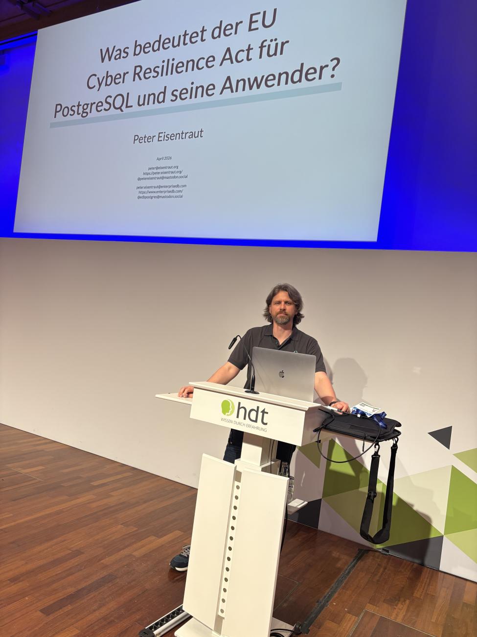 Peter Eisentraut during his PGConf DE talk on the CRA and its implication on PostgreSQL and its users