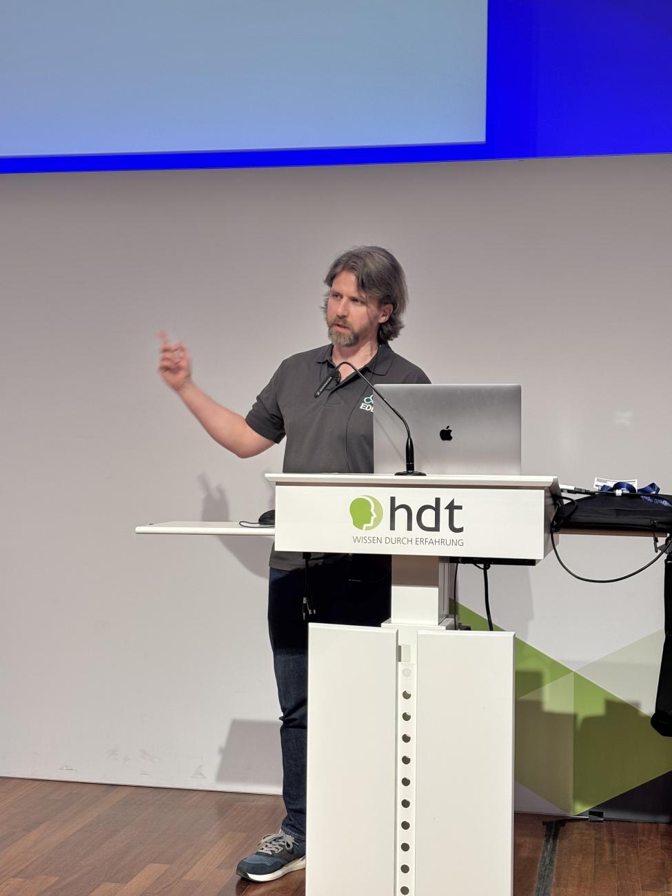 Peter Eisentraut during his PGConf DE talk on the CRA and its implication on PostgreSQL and its users