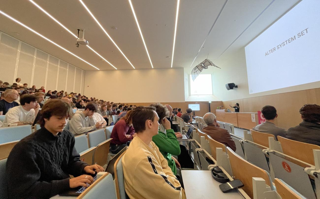 Boriss Mejias presenting his PGConf BE session to a packed room