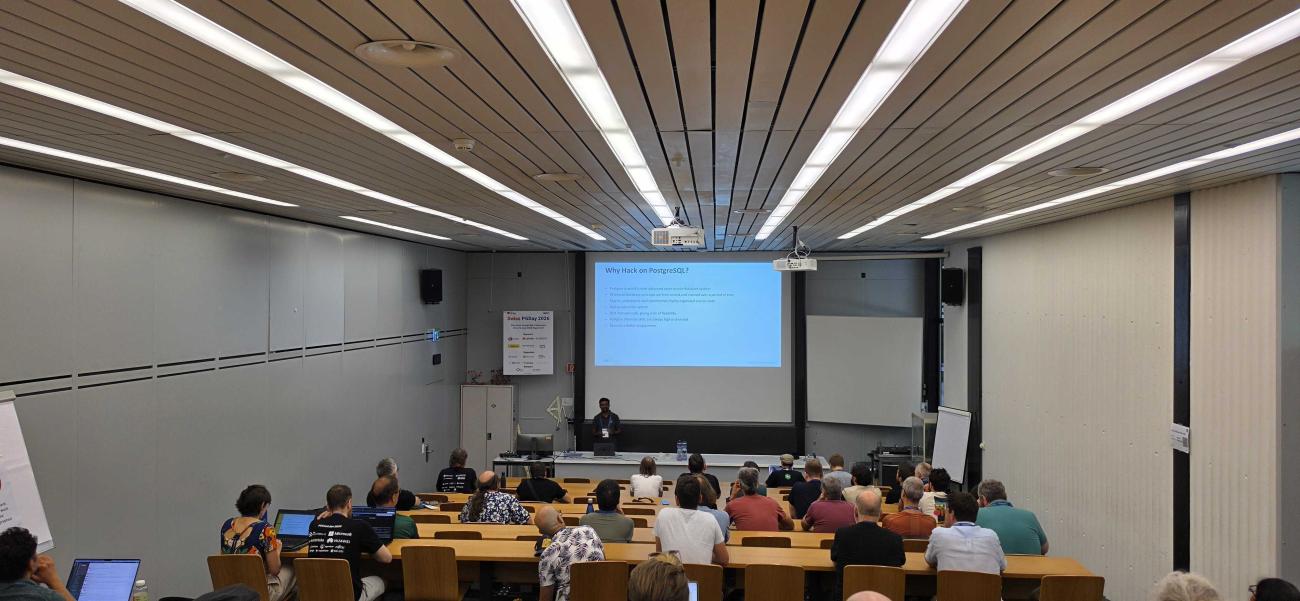 Suraj Kharage presenting at Swiss PGDay