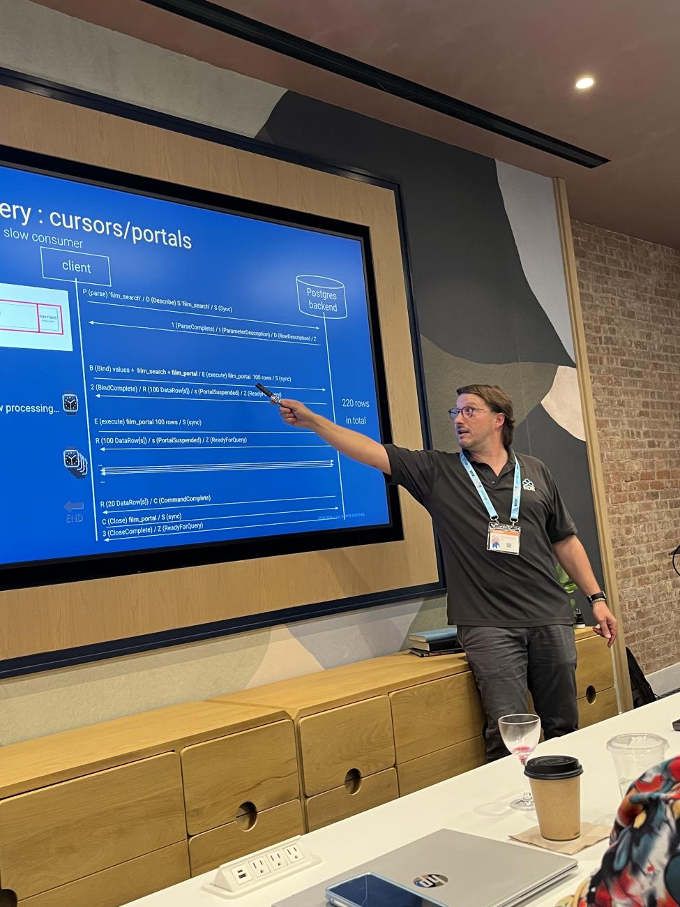 Xavier Fischer presenting at Postgres Summit US